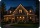 Nighttime illuminated-house thumbnail for Brown Family.