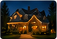 Nighttime illuminated-house thumbnail for Thompson Family.