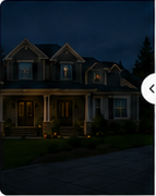 Dark before-state nighttime photo of the house with no visible holiday roofline lighting.