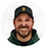 Circular headshot of David Anderson, smiling man wearing a dark baseball cap.